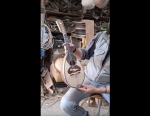 Mandolin made from 500-year-old black mulberry wood. First performance